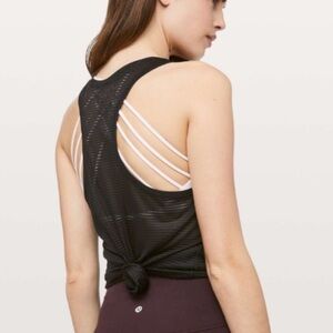 Lululemon Black Racerback. Sheer stripes.
Med